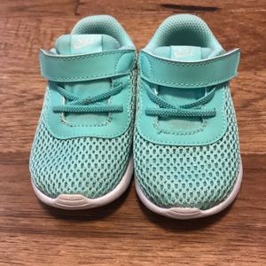 Teal Nike walking shoes